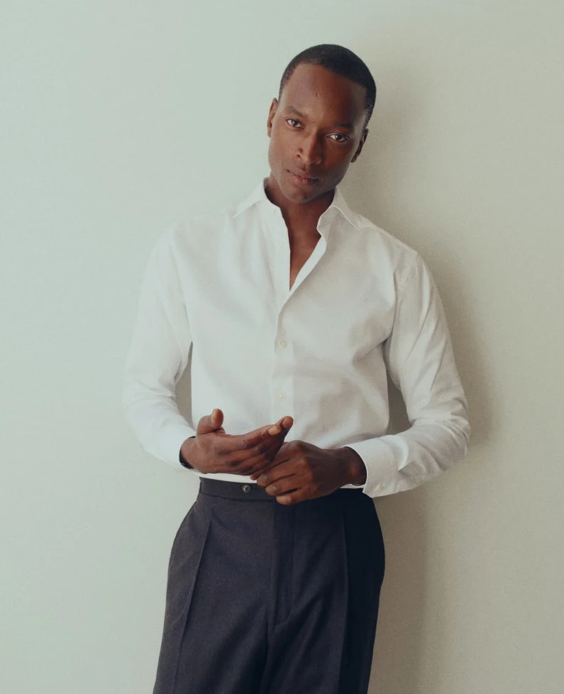 a model posing in a signature twill shirt