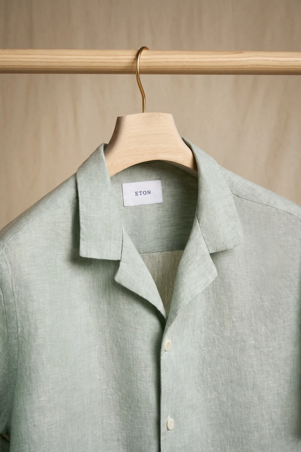green linen resort shirt