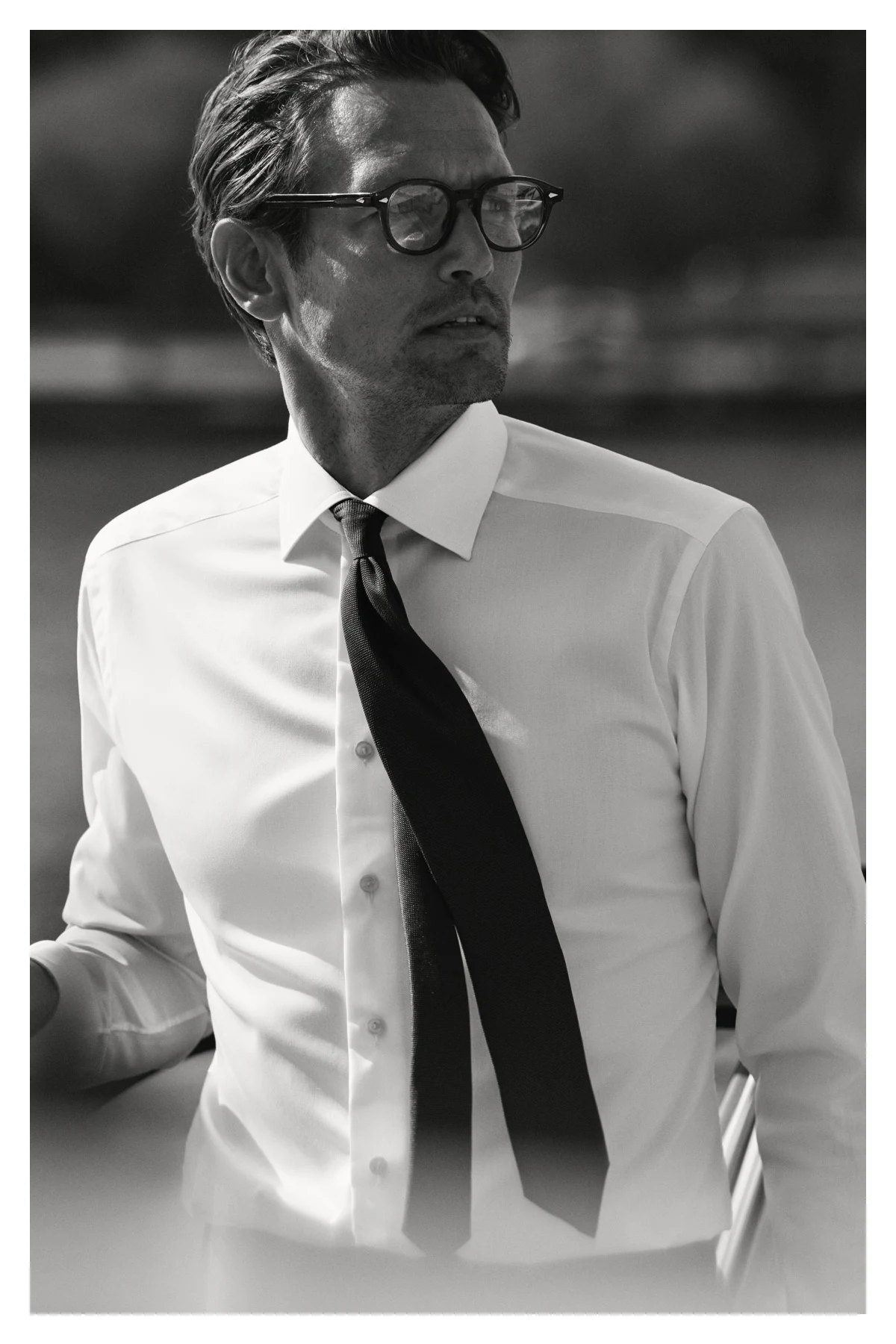 white shirt on model with tie black and white image