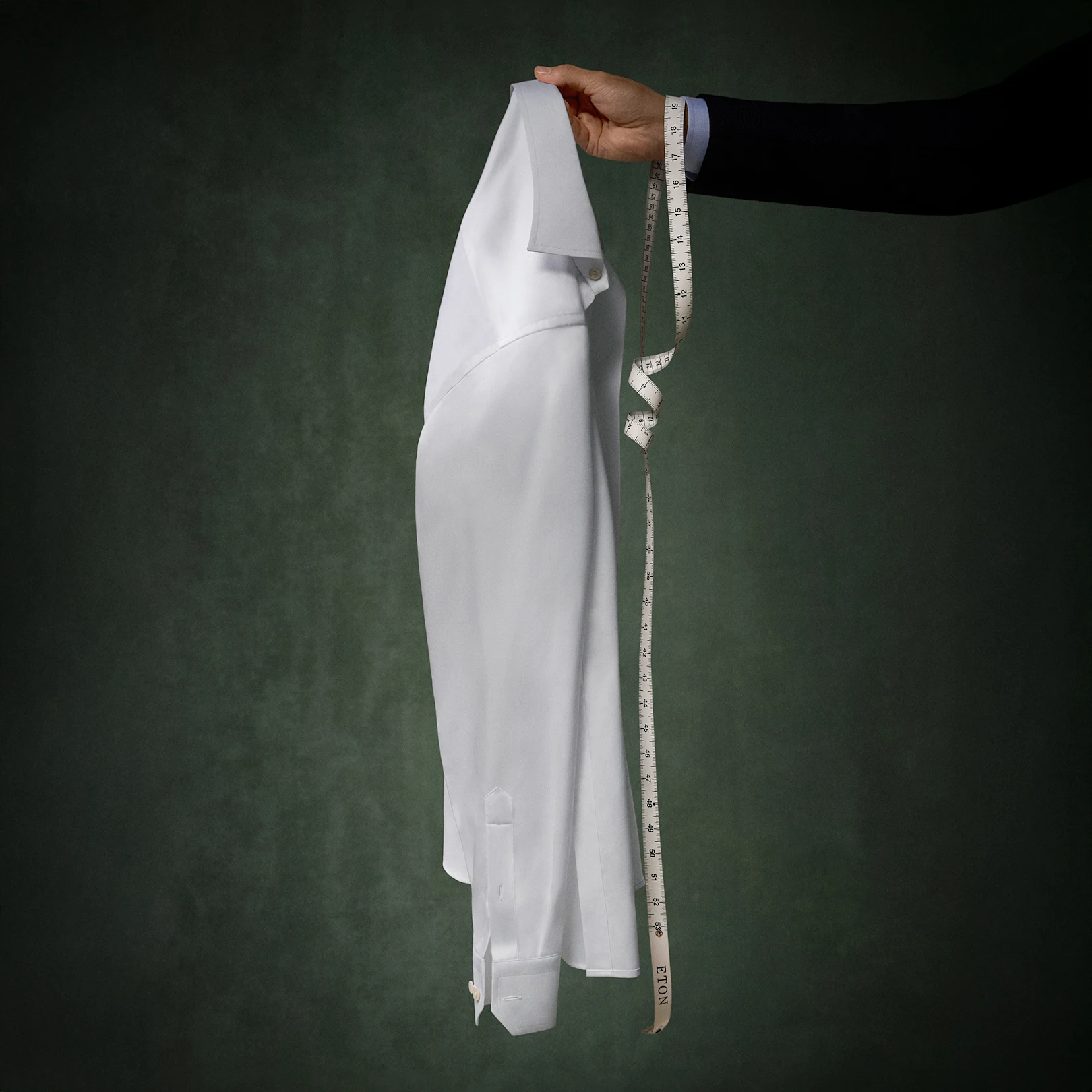 measuring band and white shirt