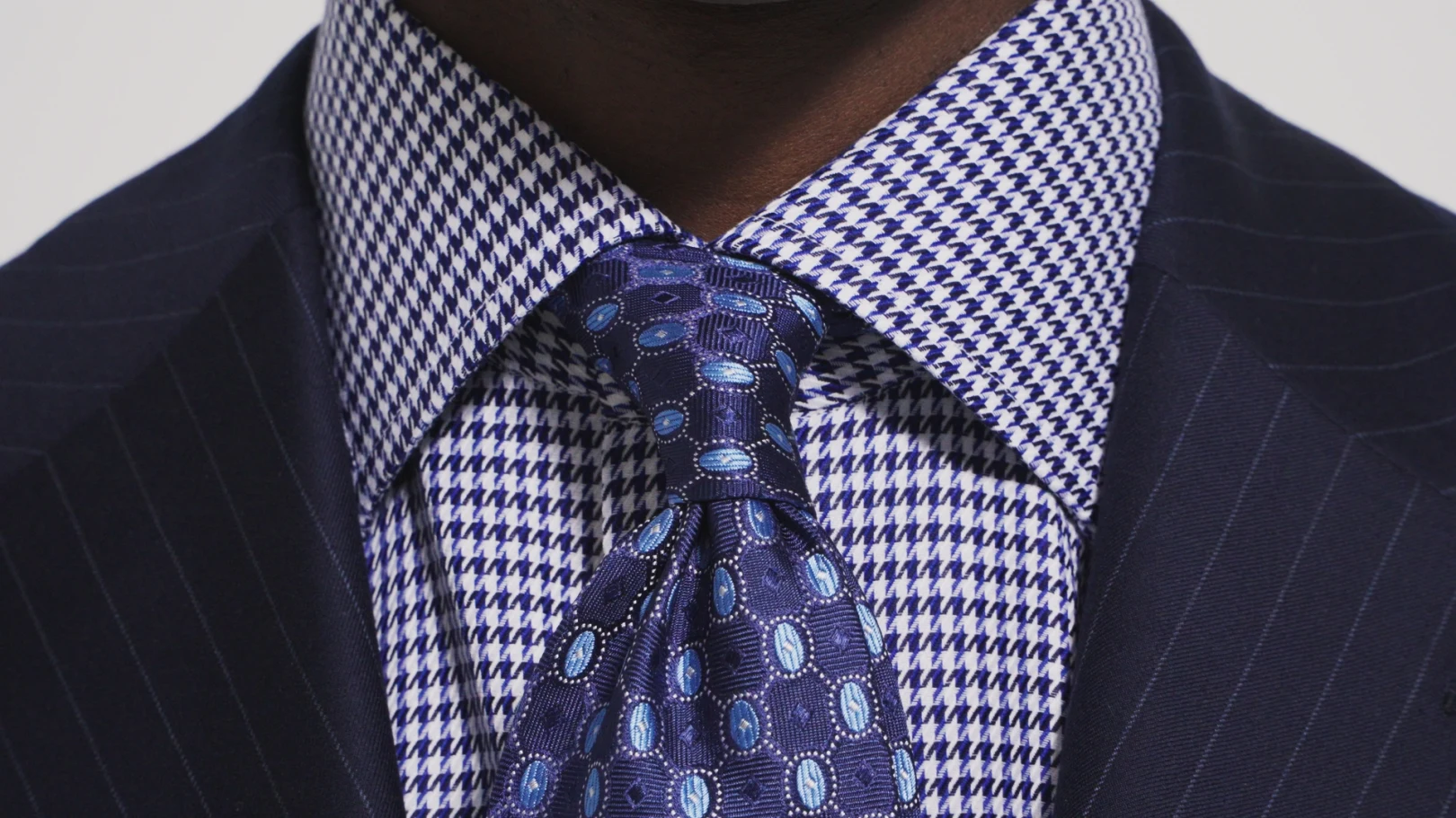 model houndstooth shirt and patterned tie