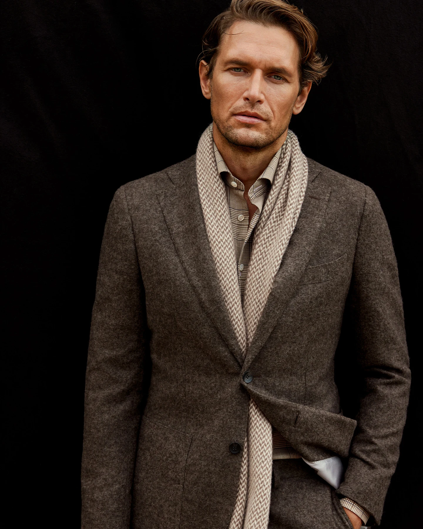 model in brown overshirt and beige wool scarf