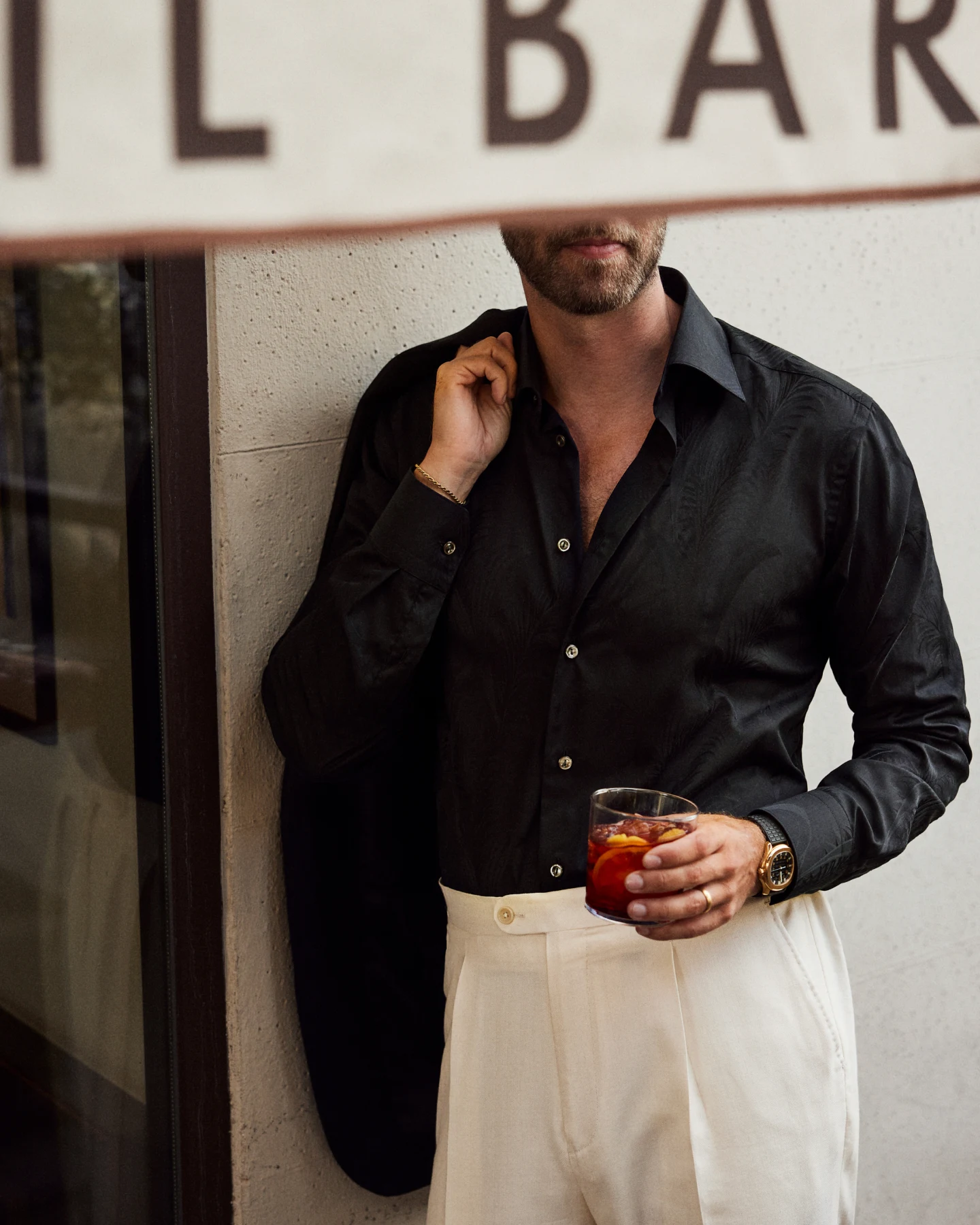 black shirt andreas weinås outside bar