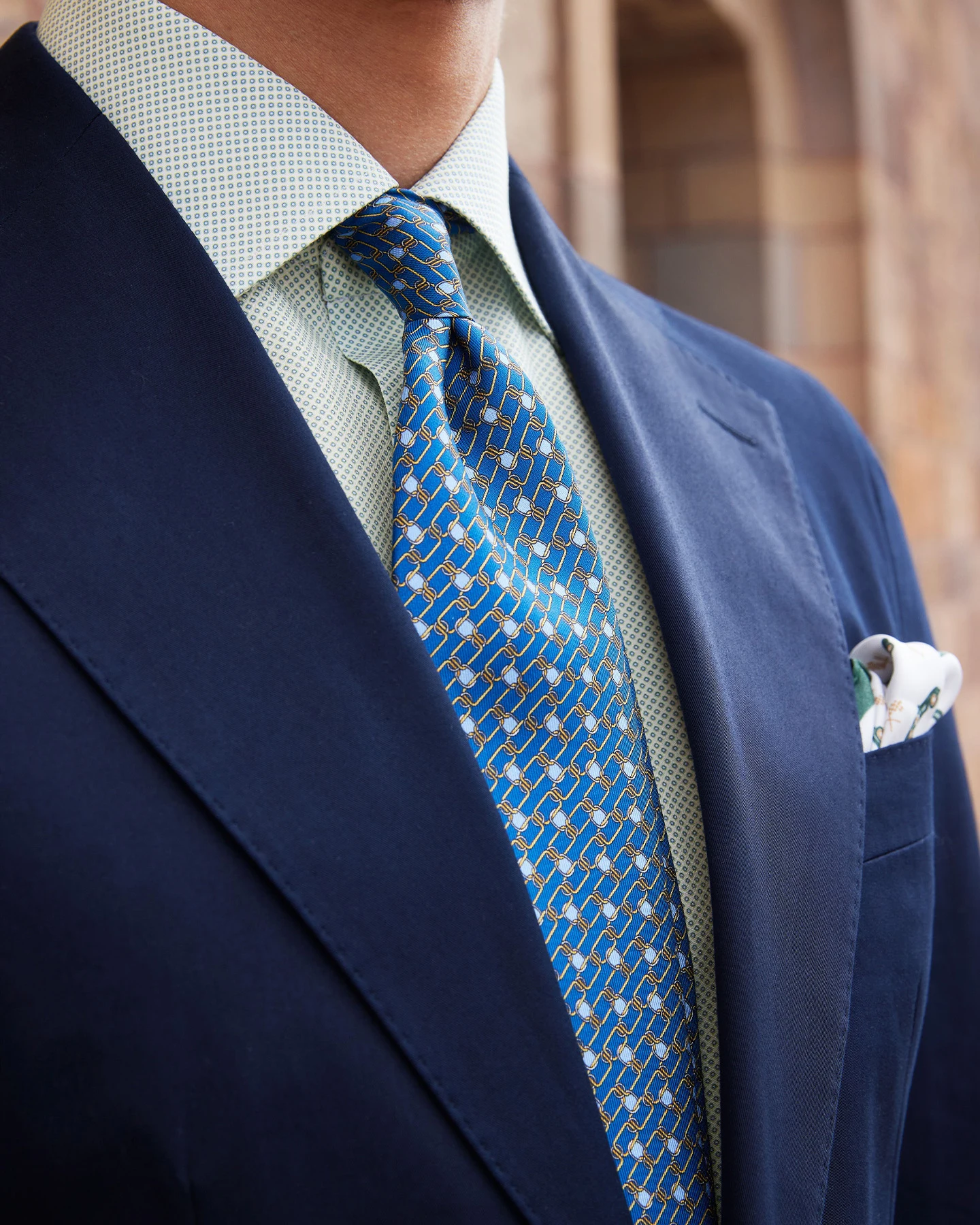 green printed shirt with tie