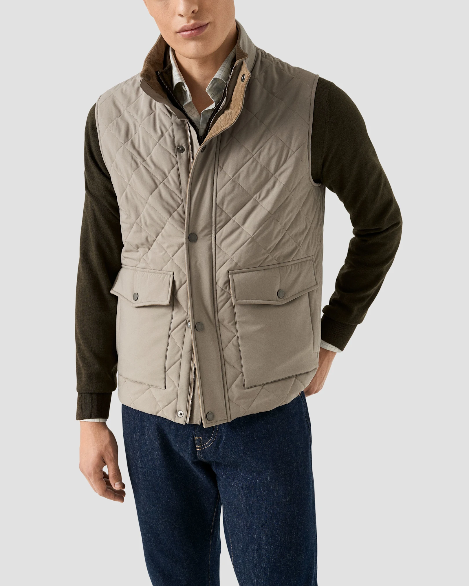 Green halp zip sweater with quilted vest