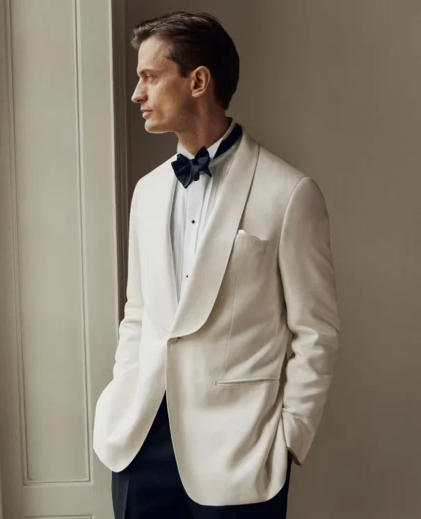 models posing in tuxedos