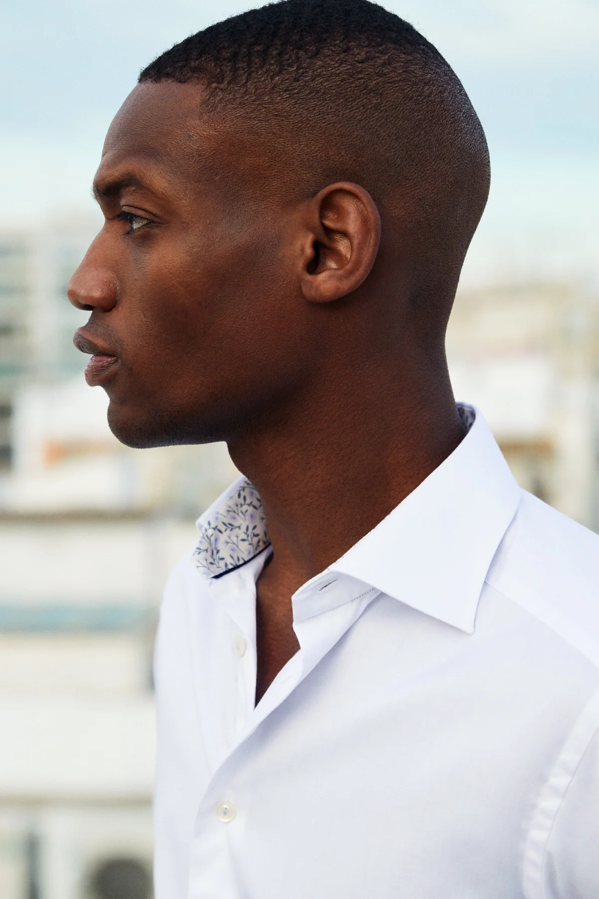 close up white shirt with contrasting collar on model