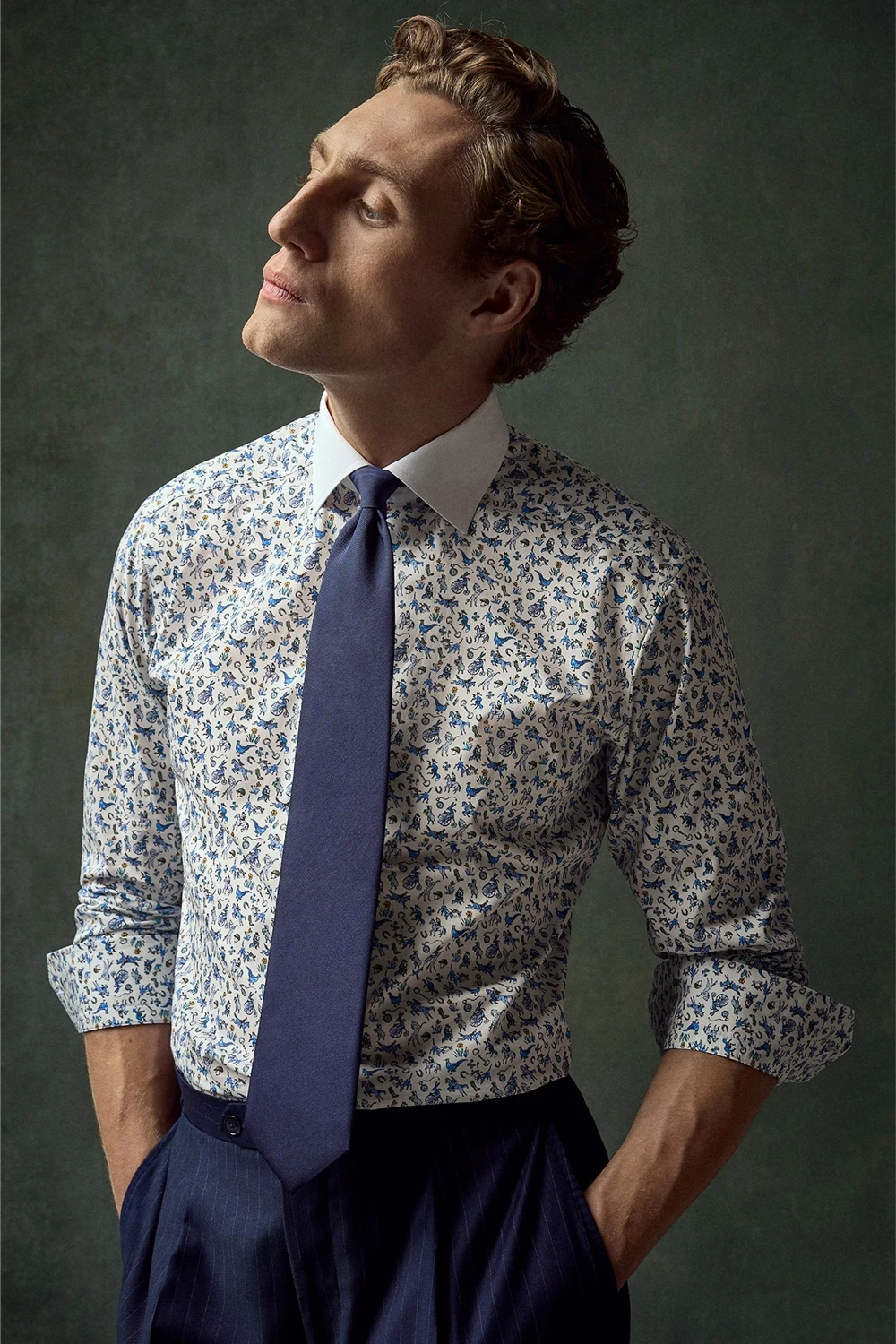 model navy tie and floral shirt