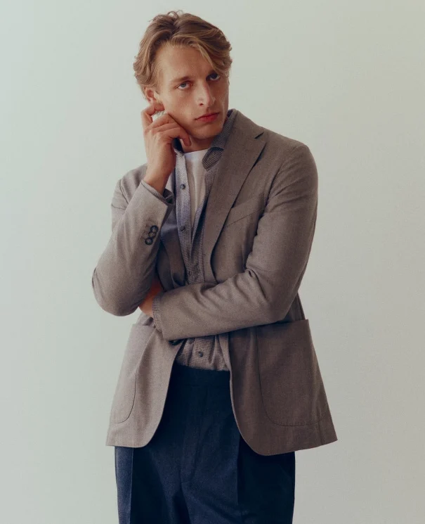 a model posing in a flannel soft jacket