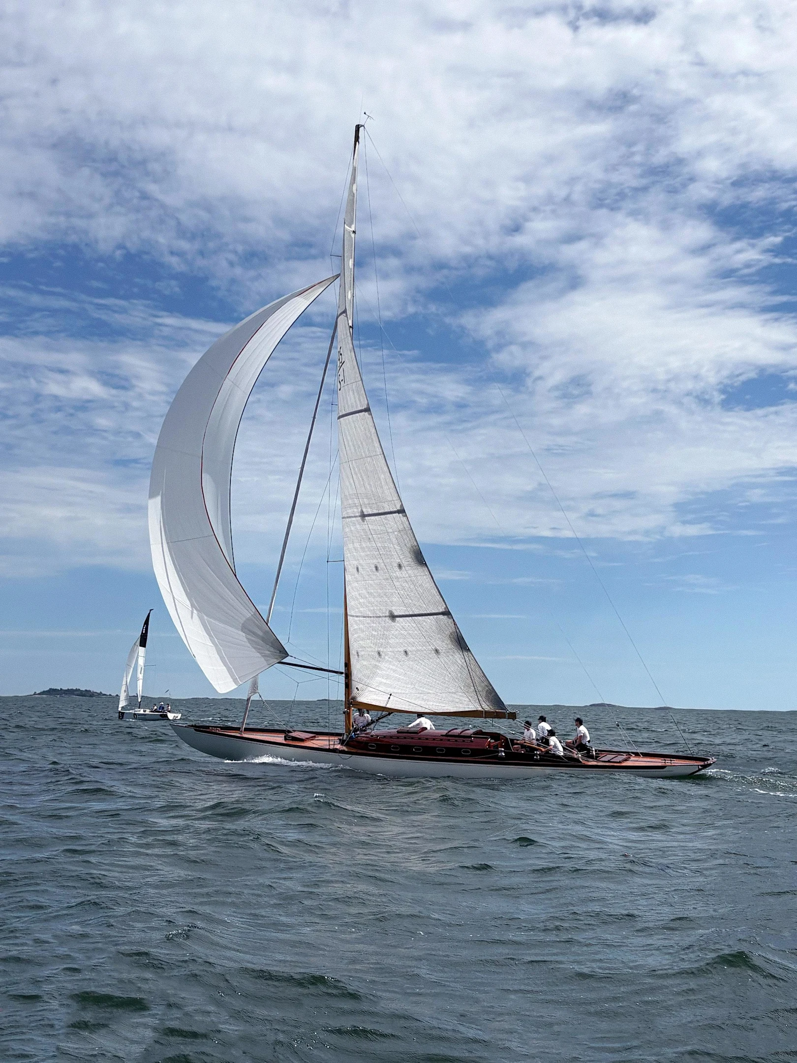 a vintage boat sailing