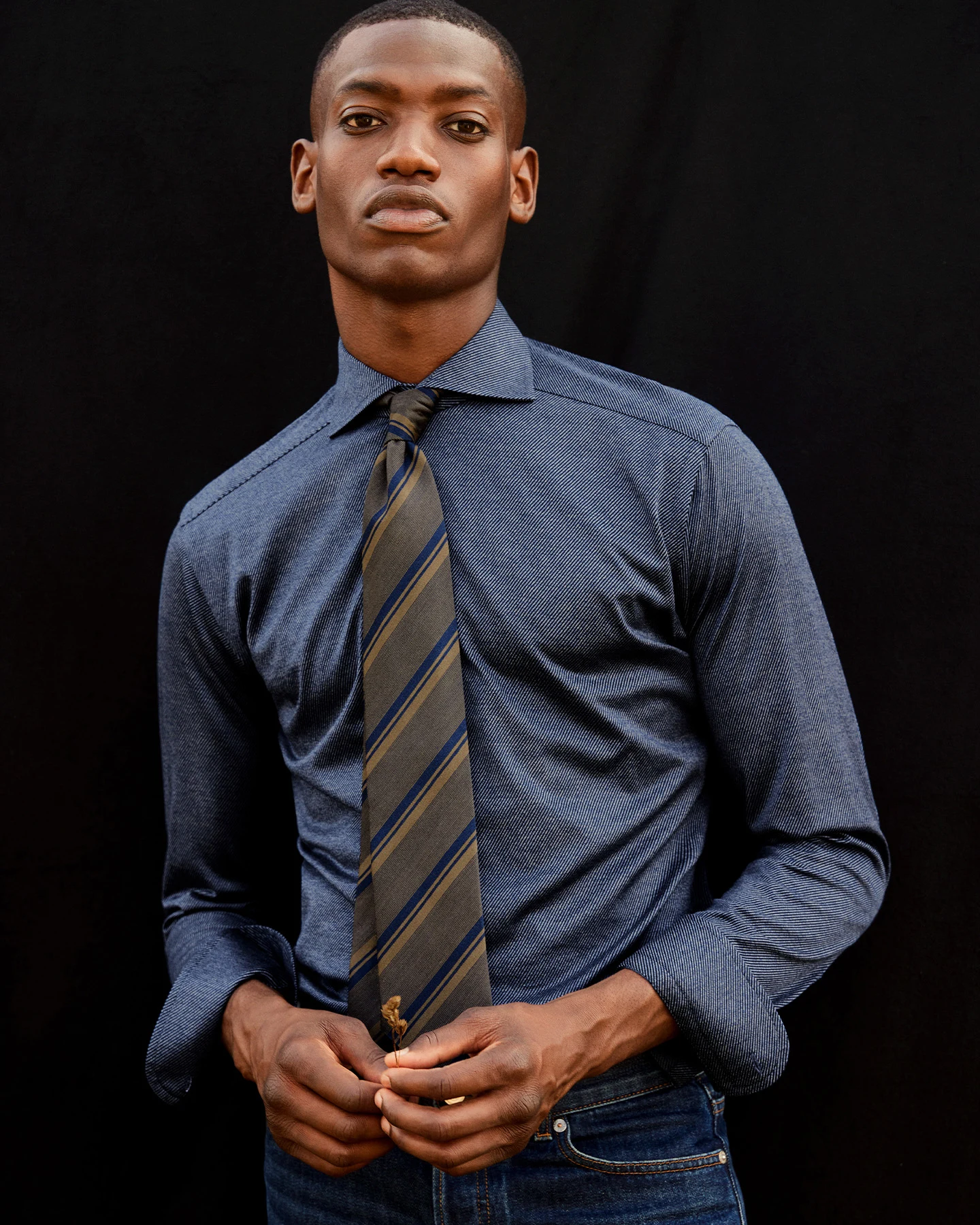 model flannel shirt and striped tie