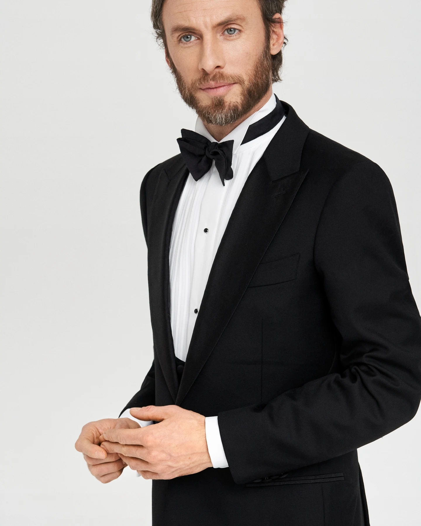 model in wing collar tuxedo