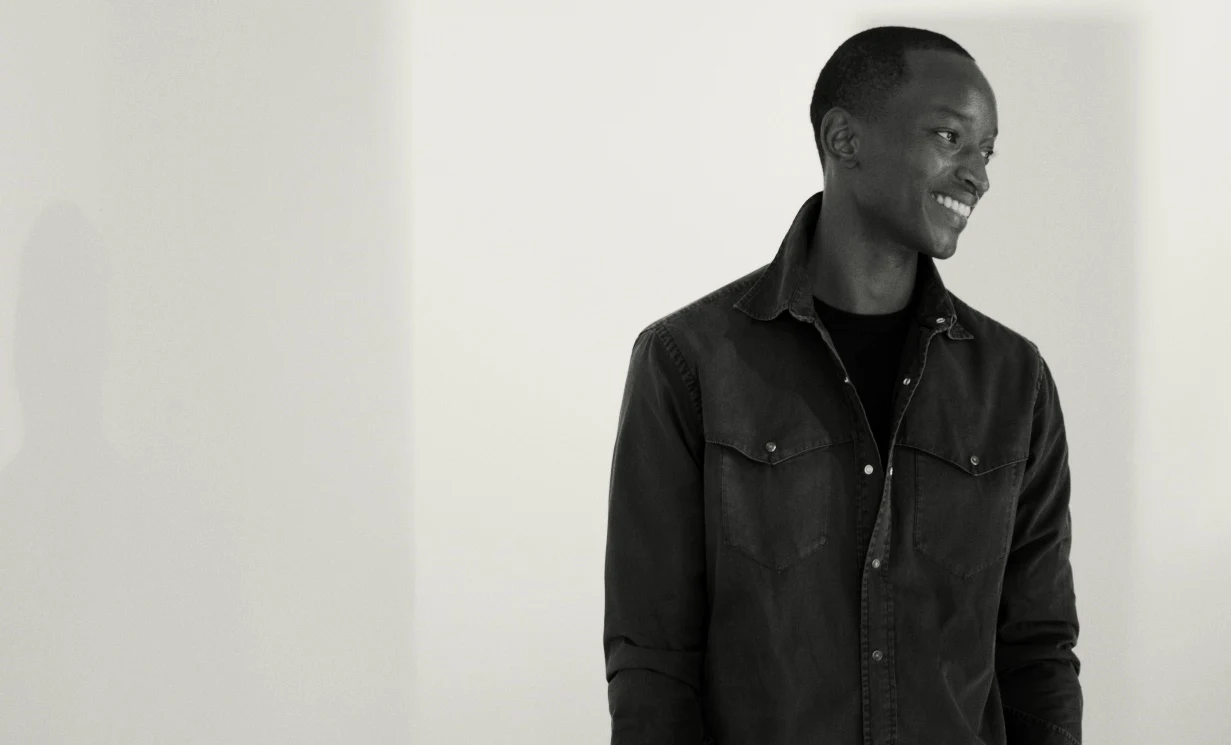 a model posing in a indigo western shirt