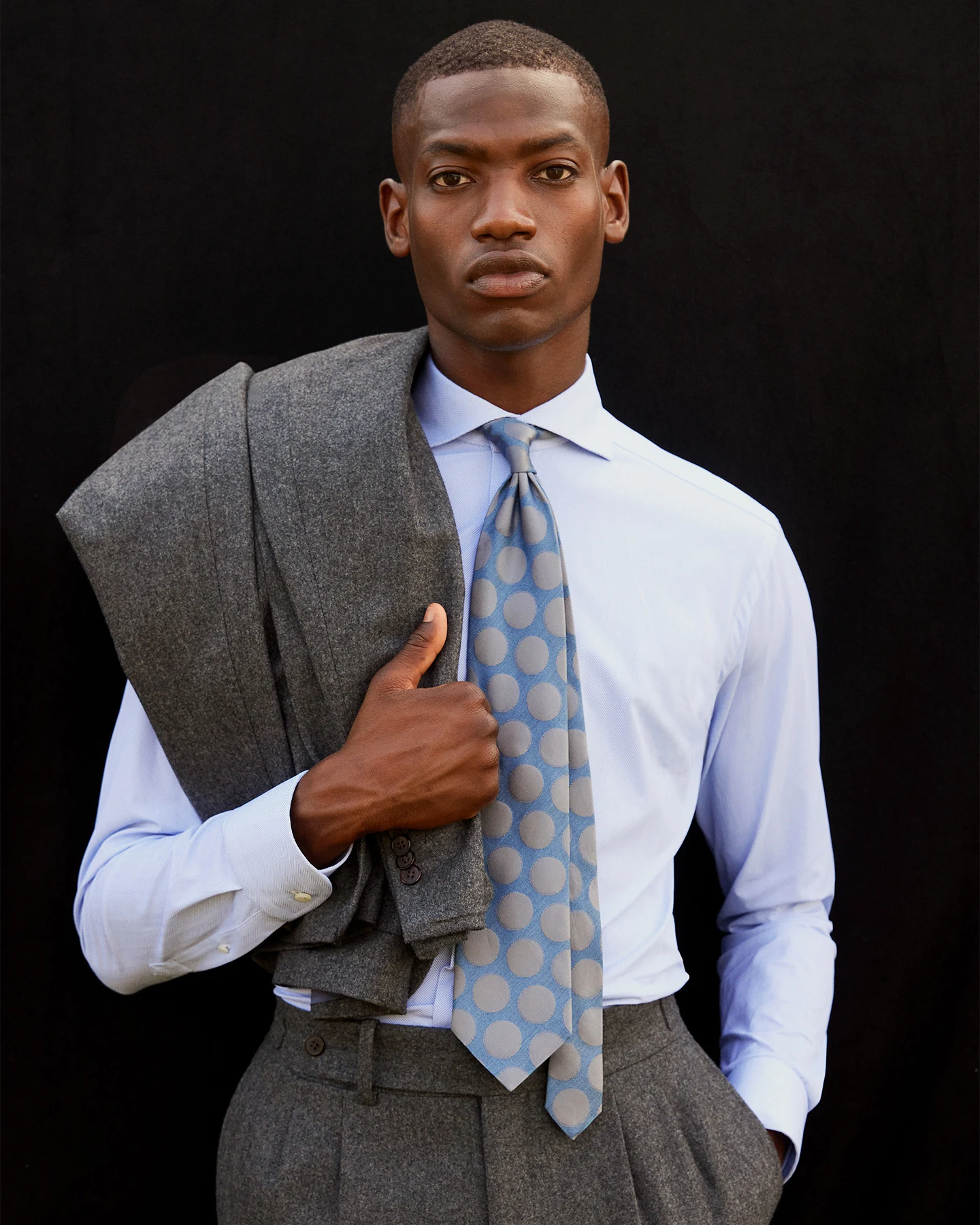 model with patterned tie and lightblue shirt