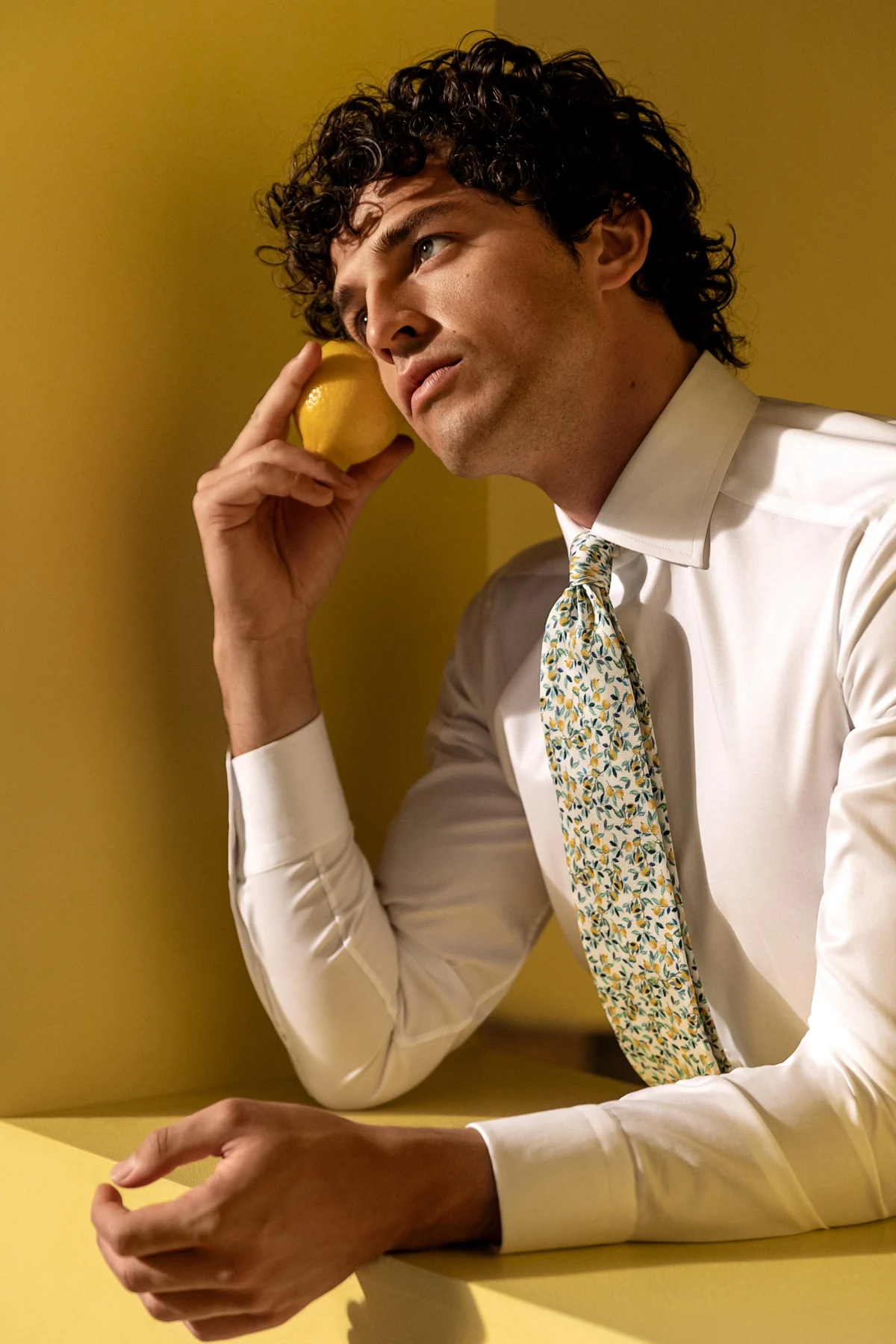 white shirt with lemon tie on model