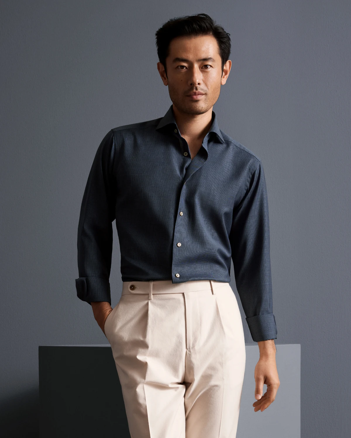 model in navy merino wool shirt