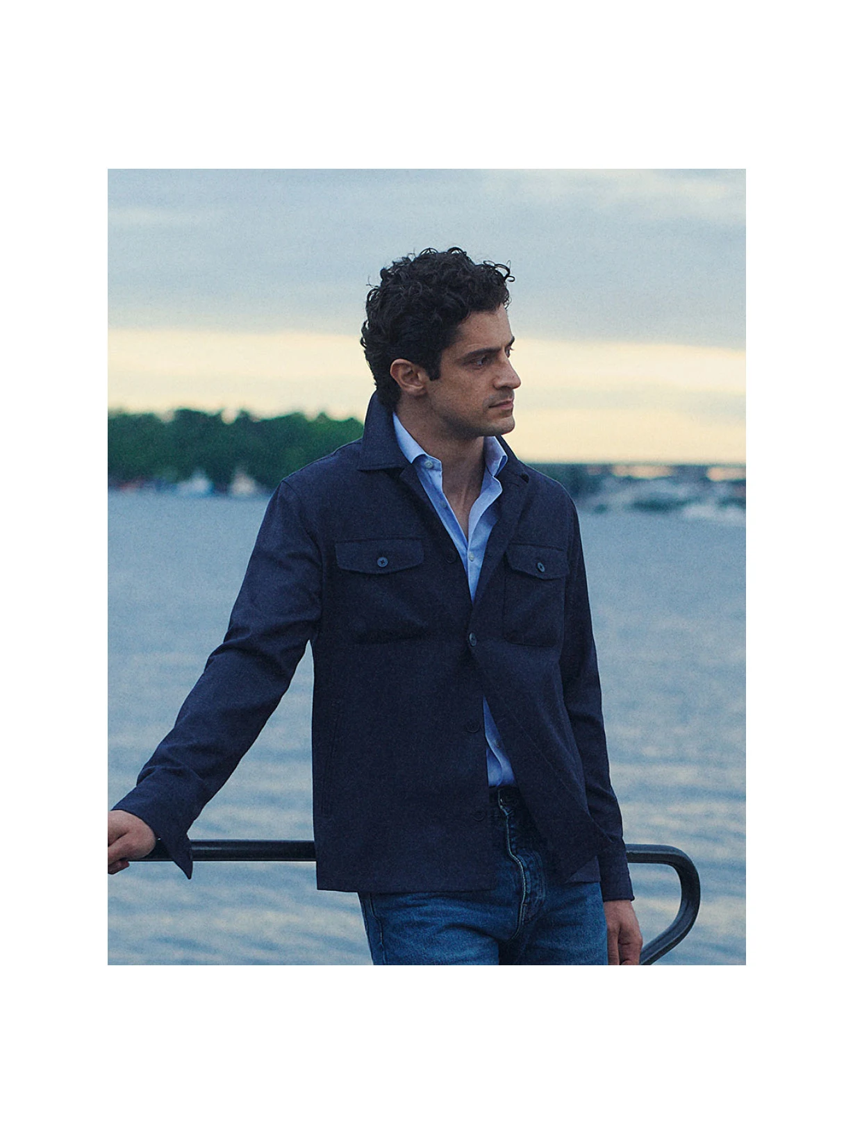 a man posing wearing a blue signature twill shirt