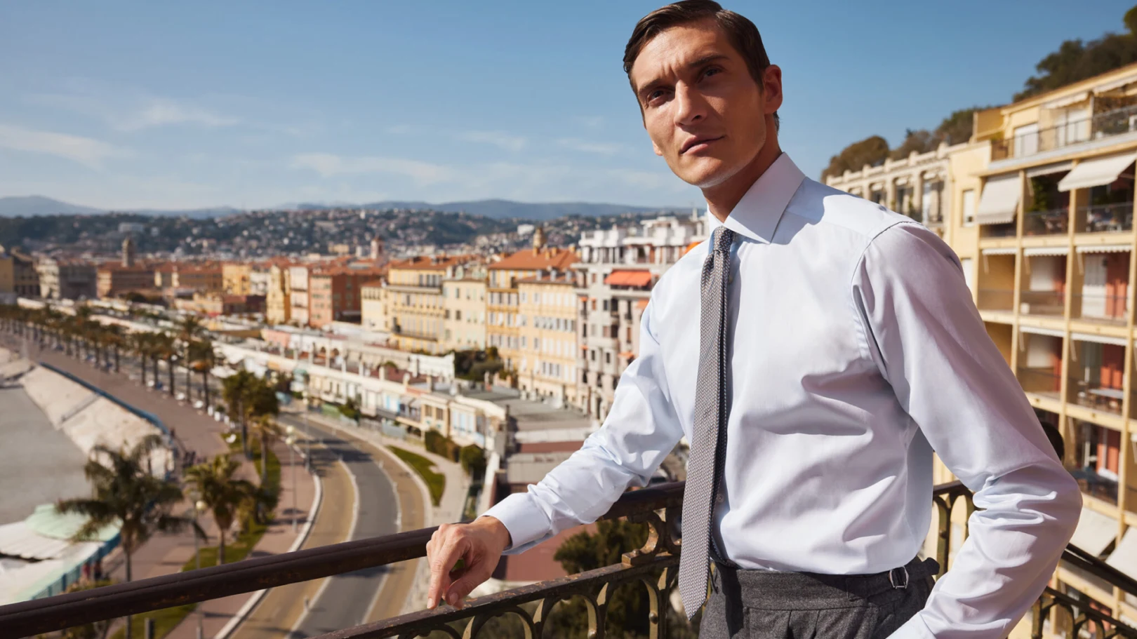 eton model in white shirt and tie