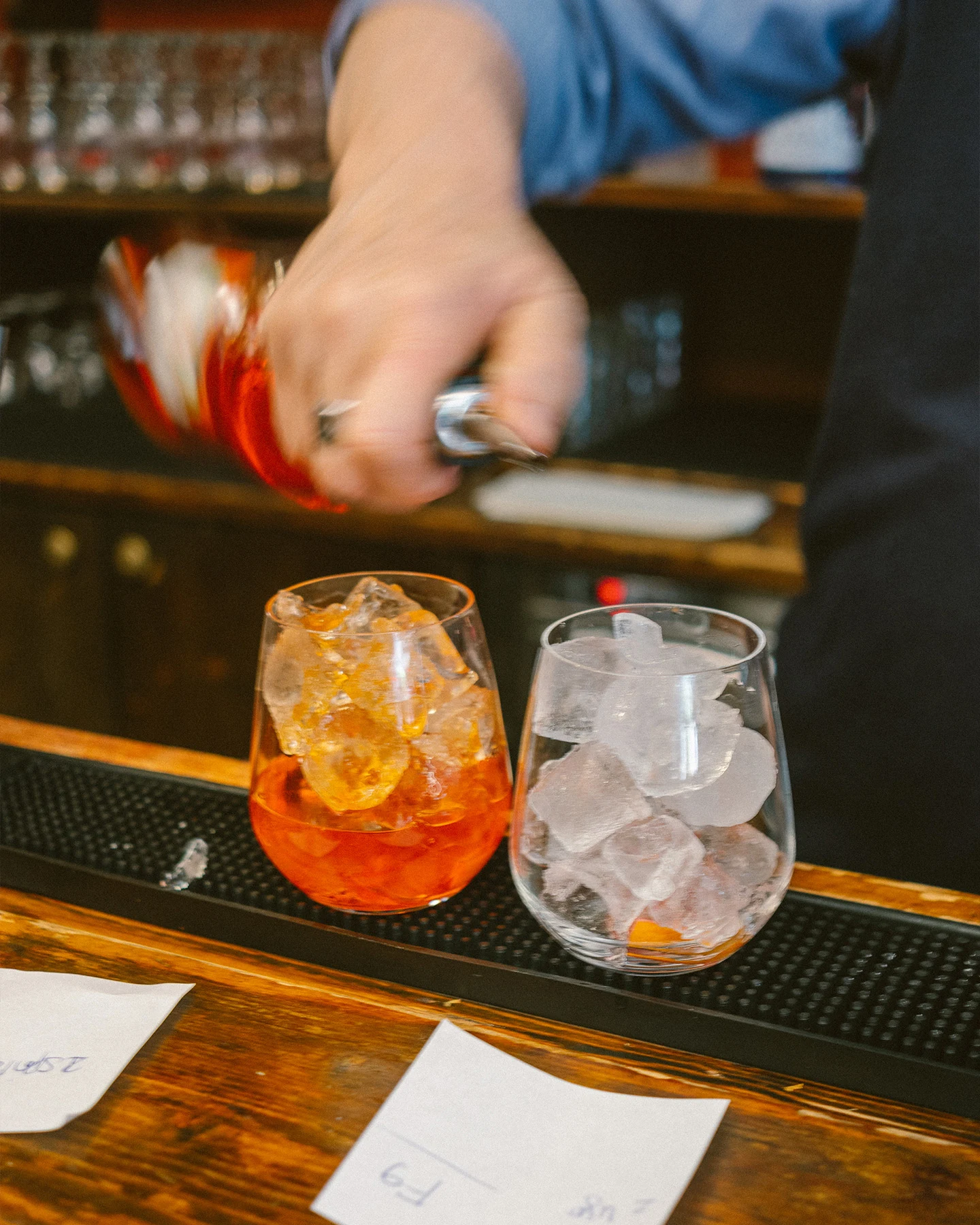 pouring aperol drinks