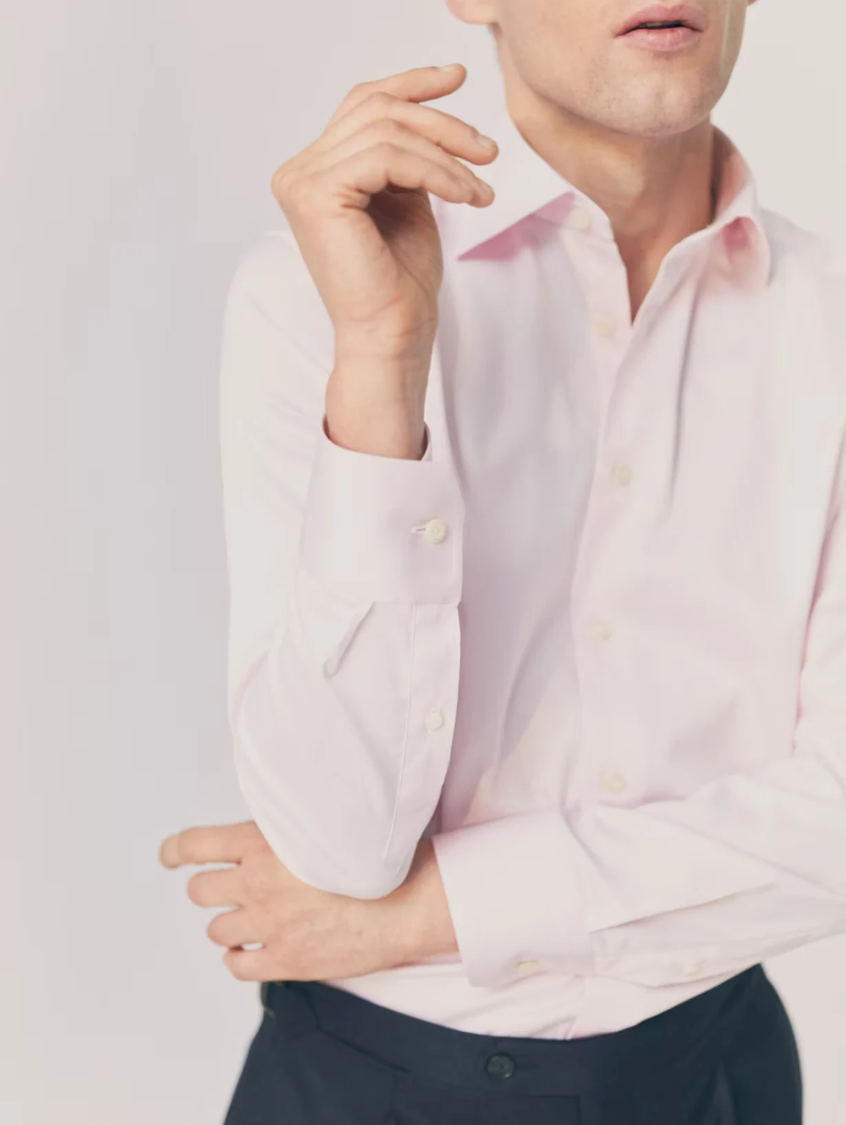 a man posing wearing a pink signature twill shirt