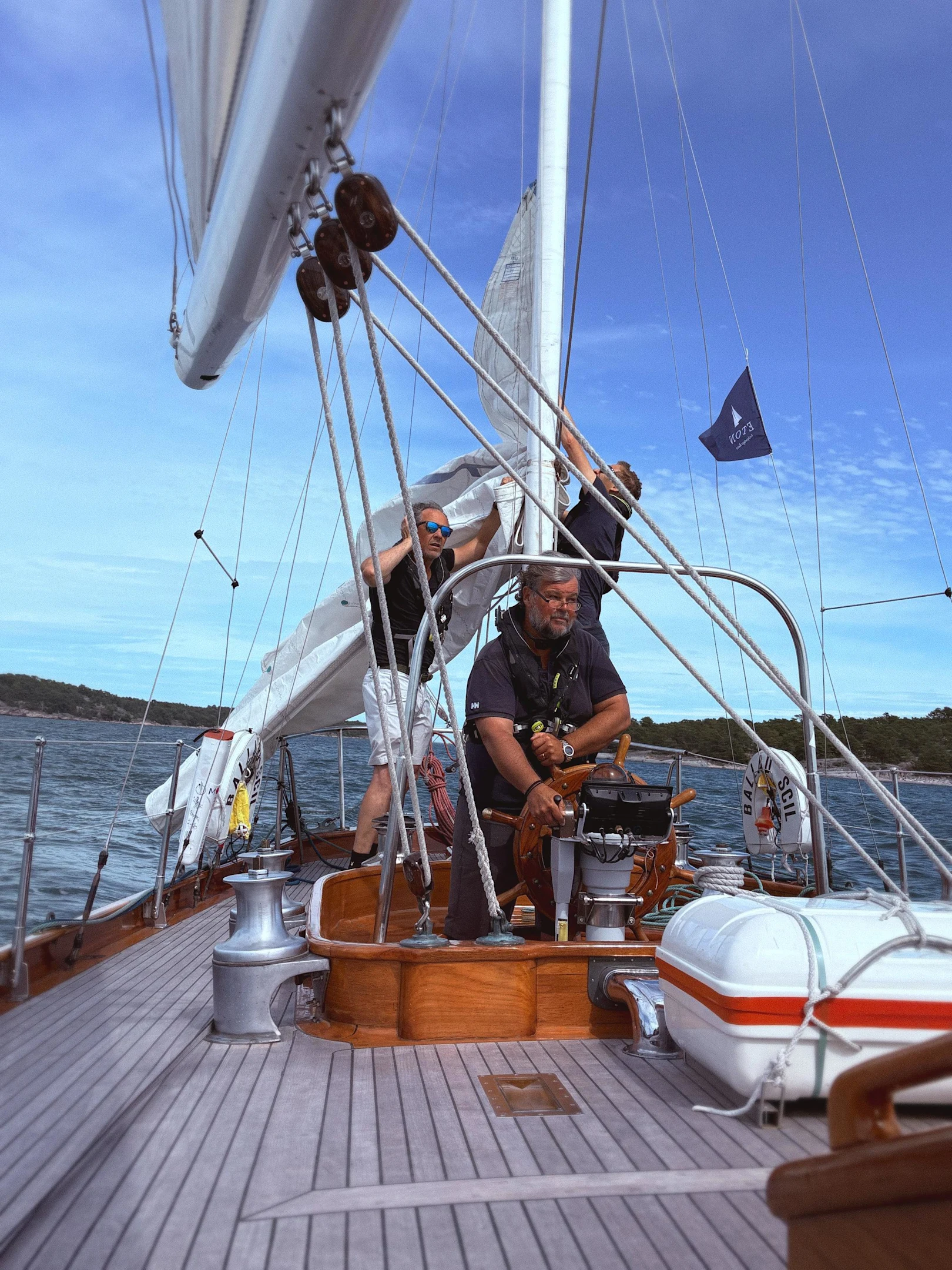 Men on a sailing boat