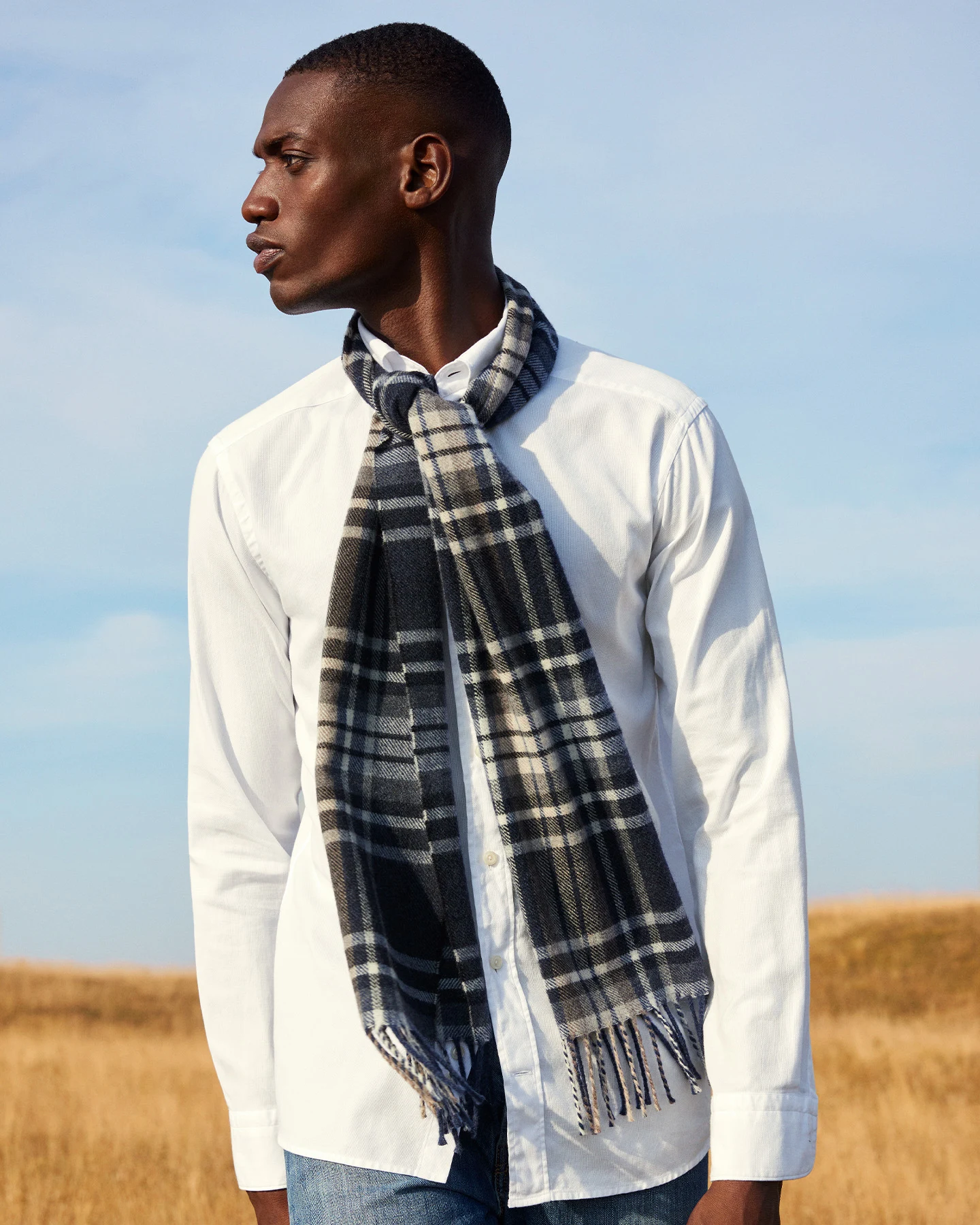 model with white shirt and wool scarf