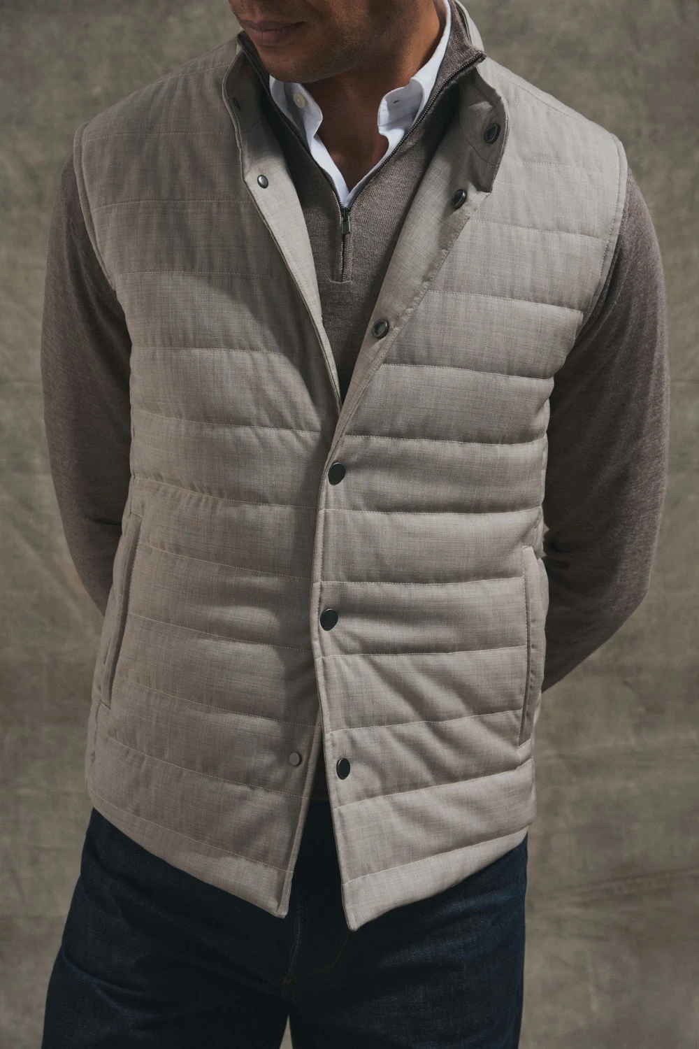 model in padded vest