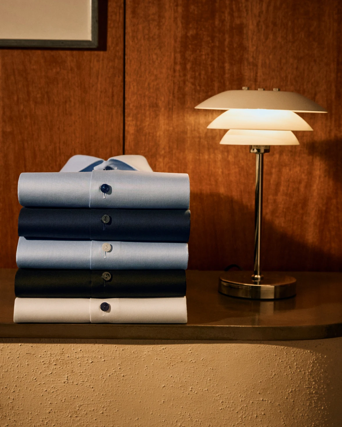 dress shirts in pile