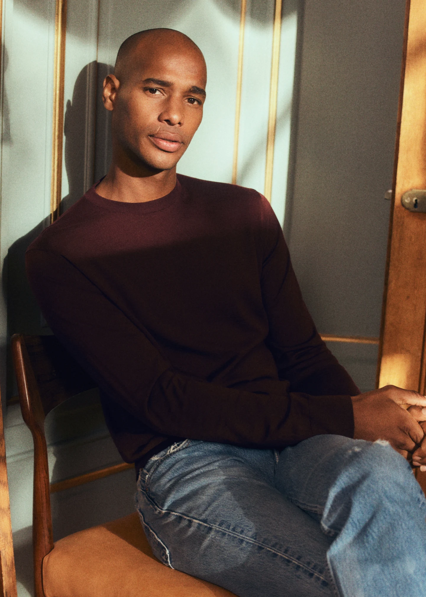 model in red merino wool sweater