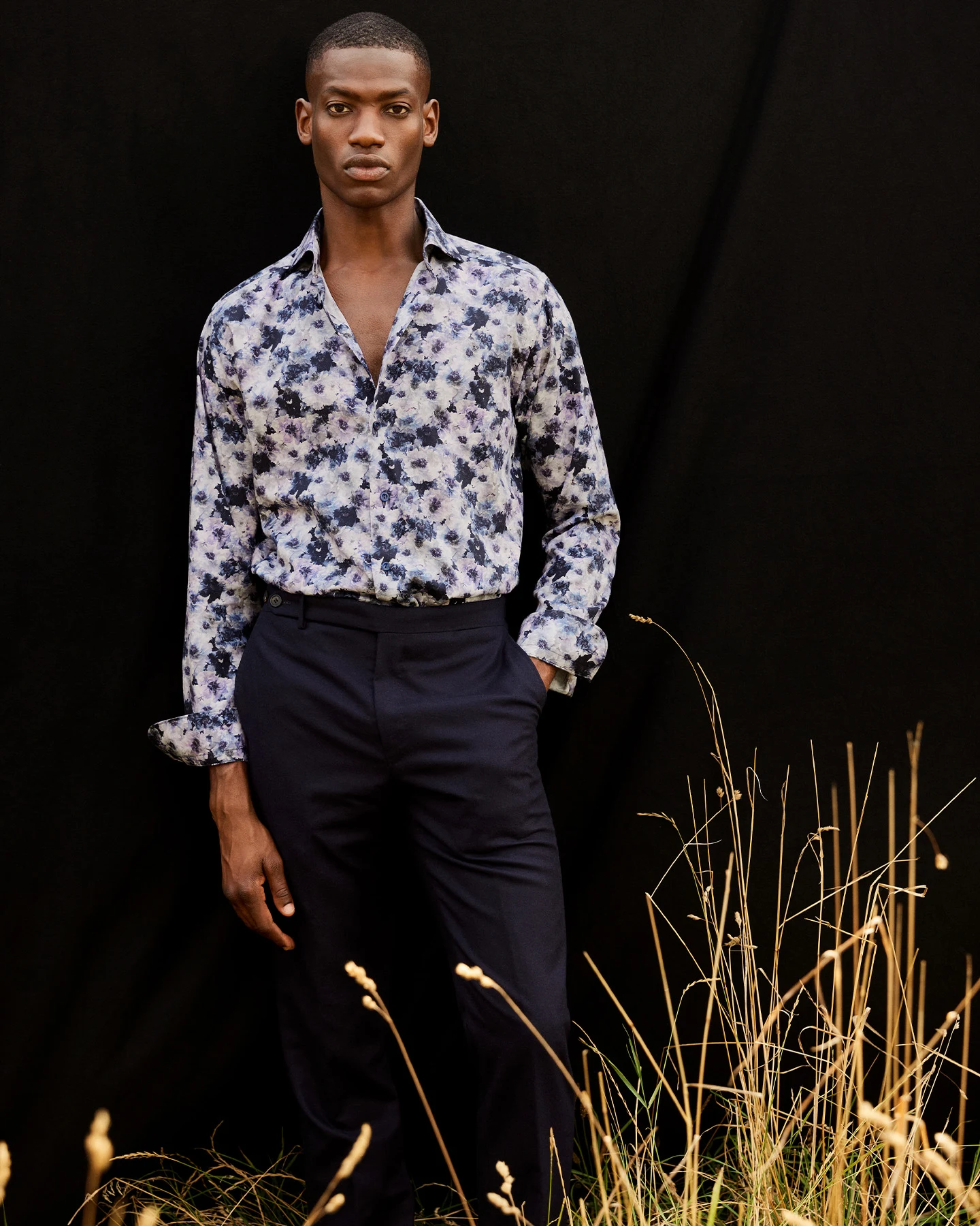 model in floral print shirt