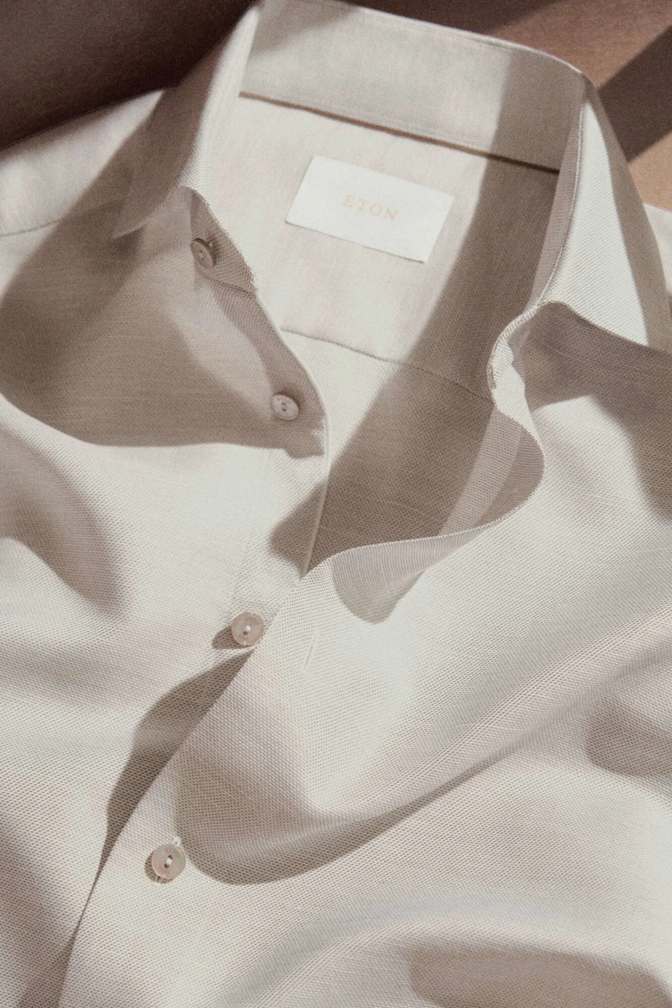 image of a shirt in some shadows casting on it