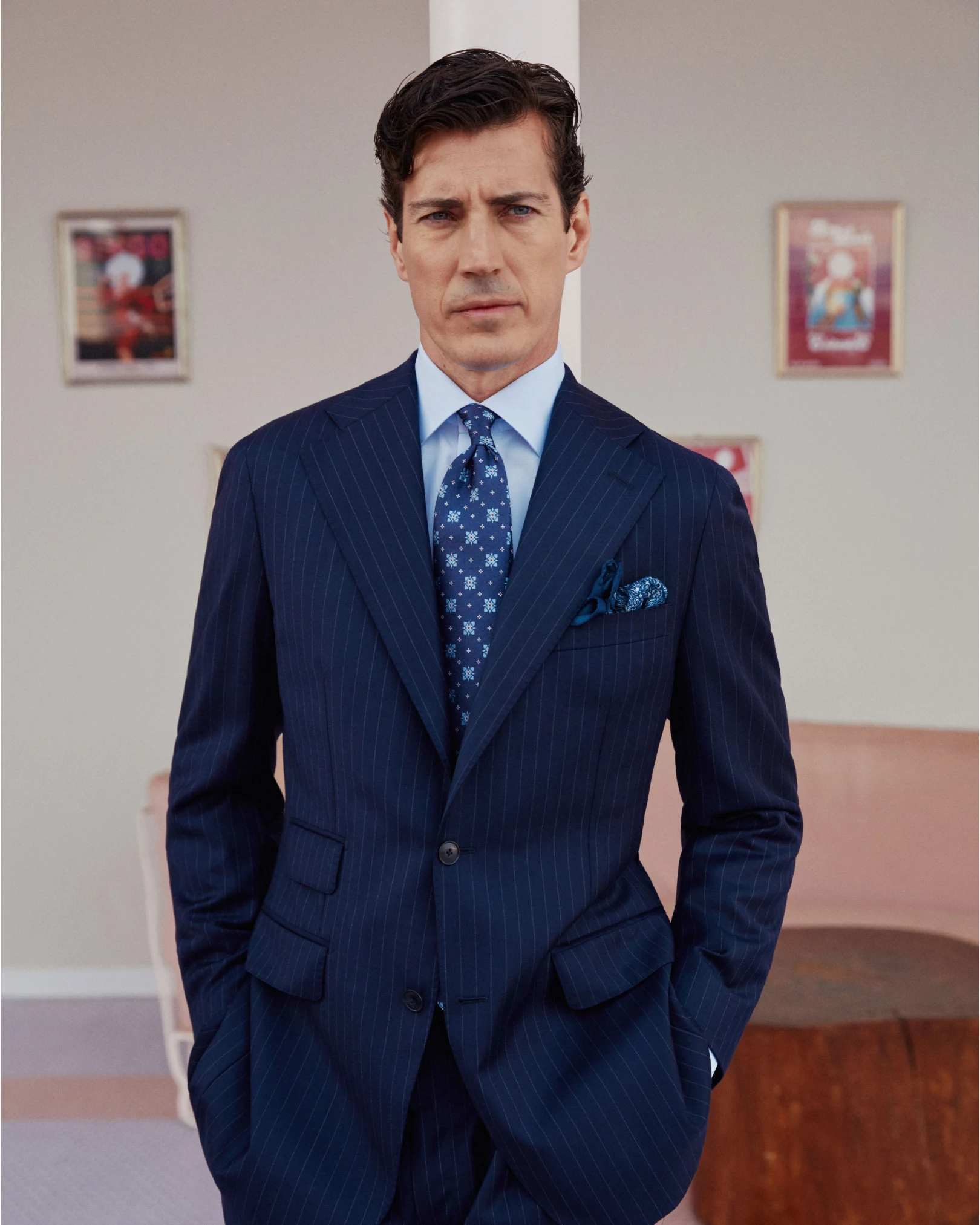 dark blue suit blue shirt and tie and pocket square on model