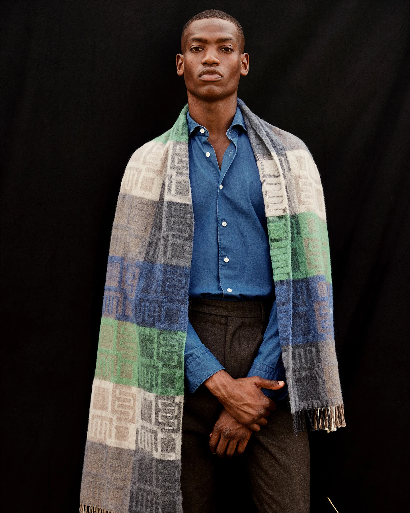 model in denim shirt and wool scarf