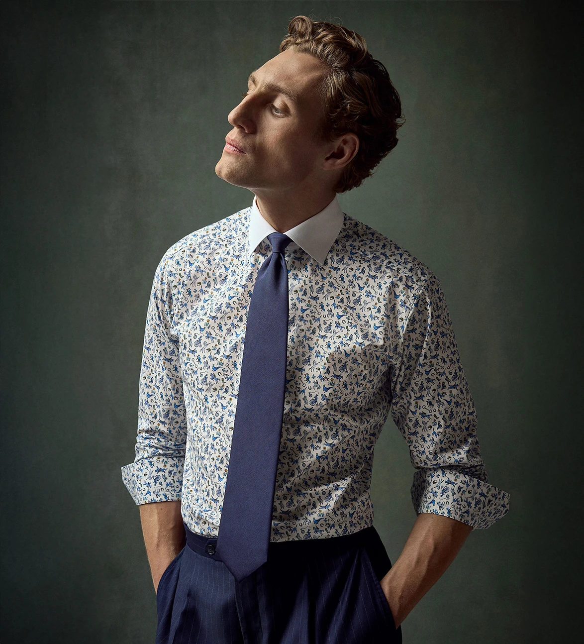 Printed shirt with a navy tie