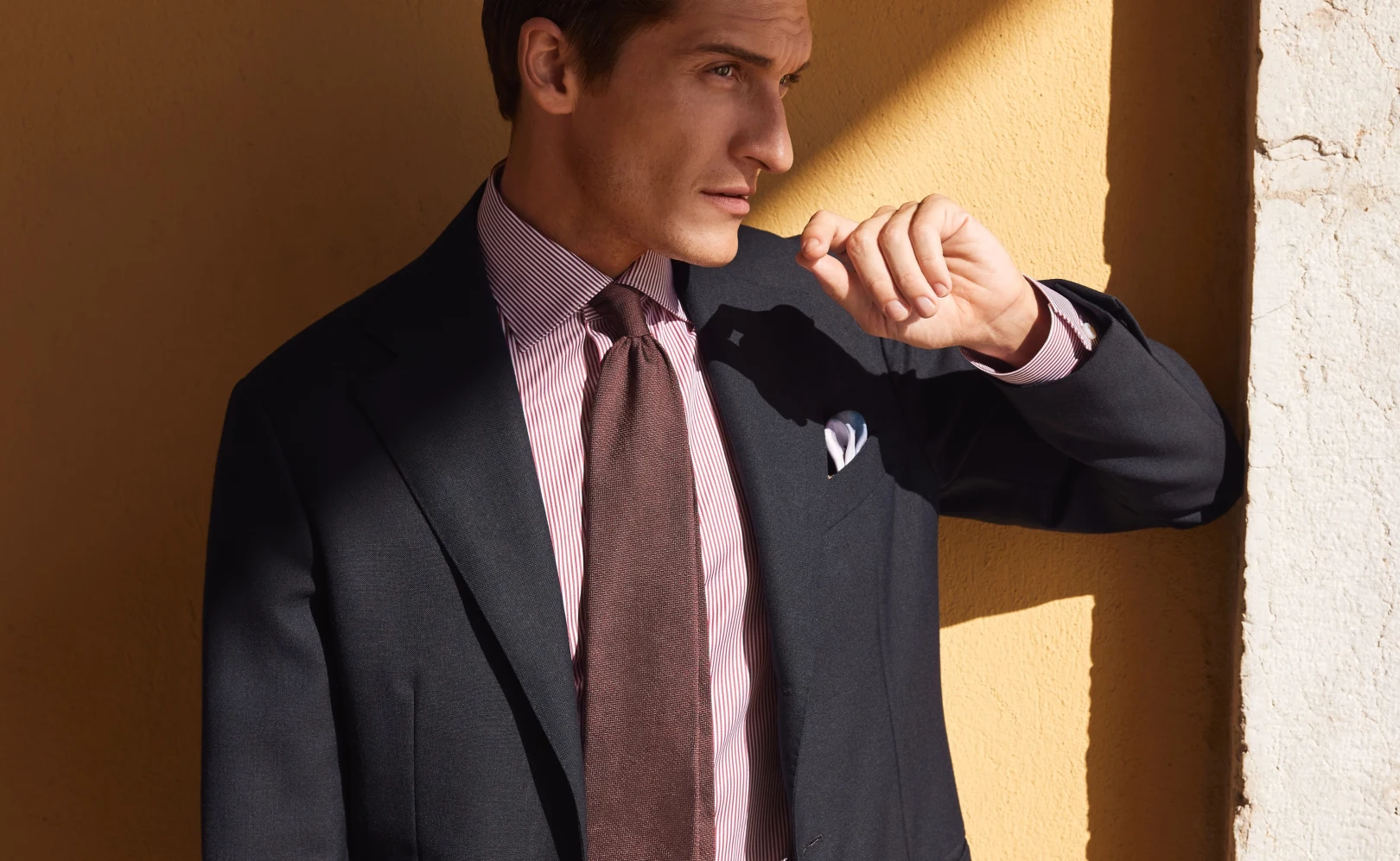 model in elevated shirt suit tie and pocket square