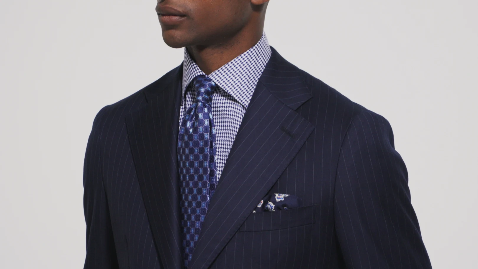 model houndstooth shirt and patterned tie