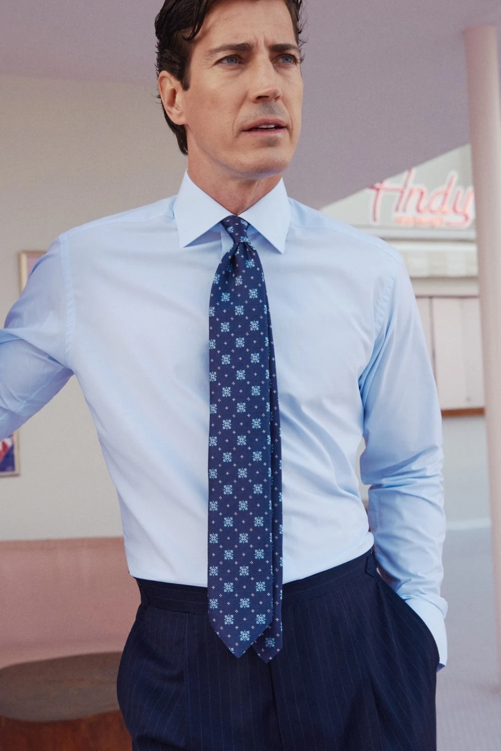 model in tie and shirt in blue shades