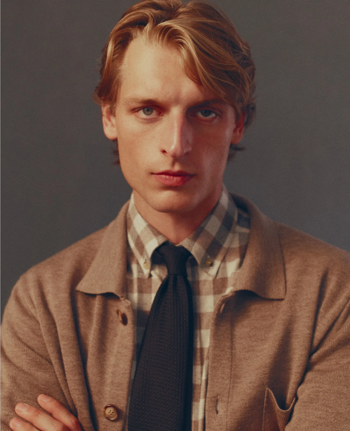 man posing in a milano knit overshirt