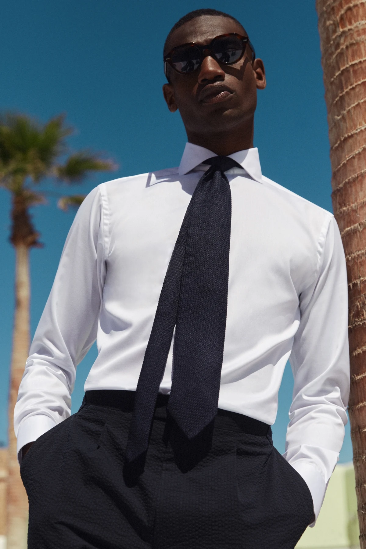 wide spread white shirt with tie styled on model