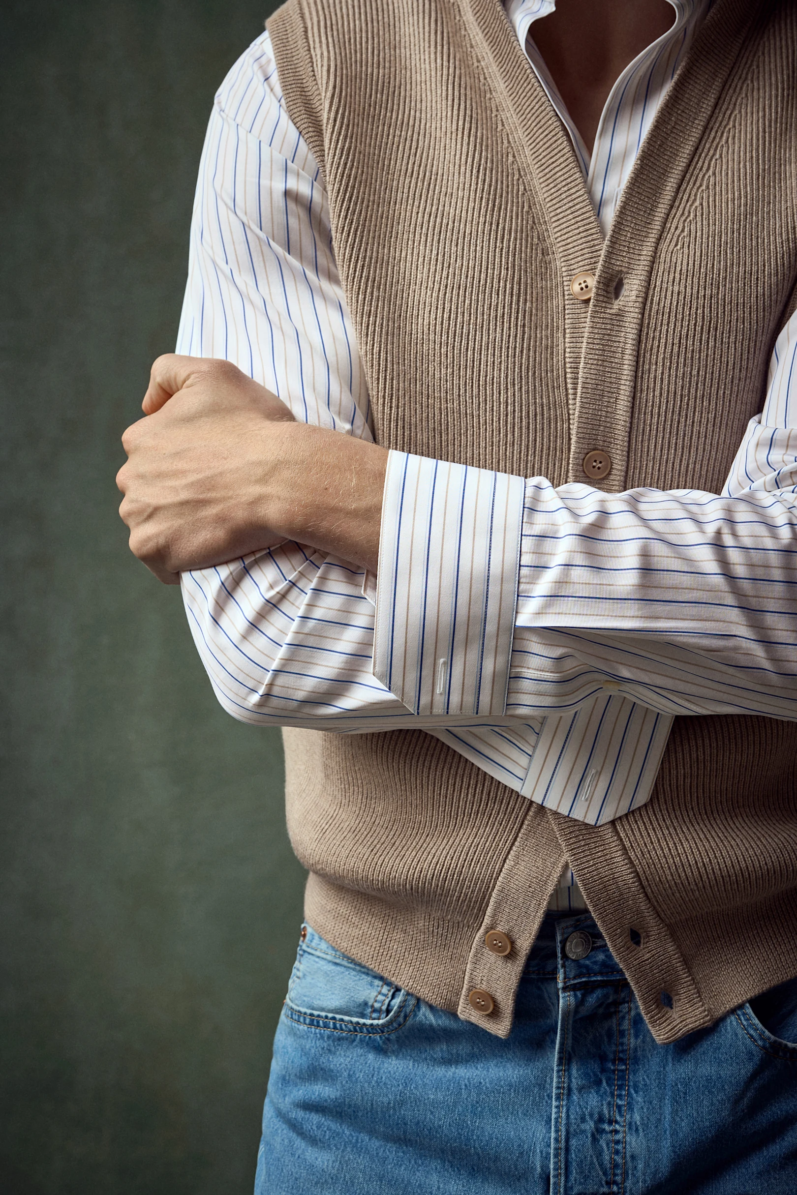 knitted vest and shirt underneath