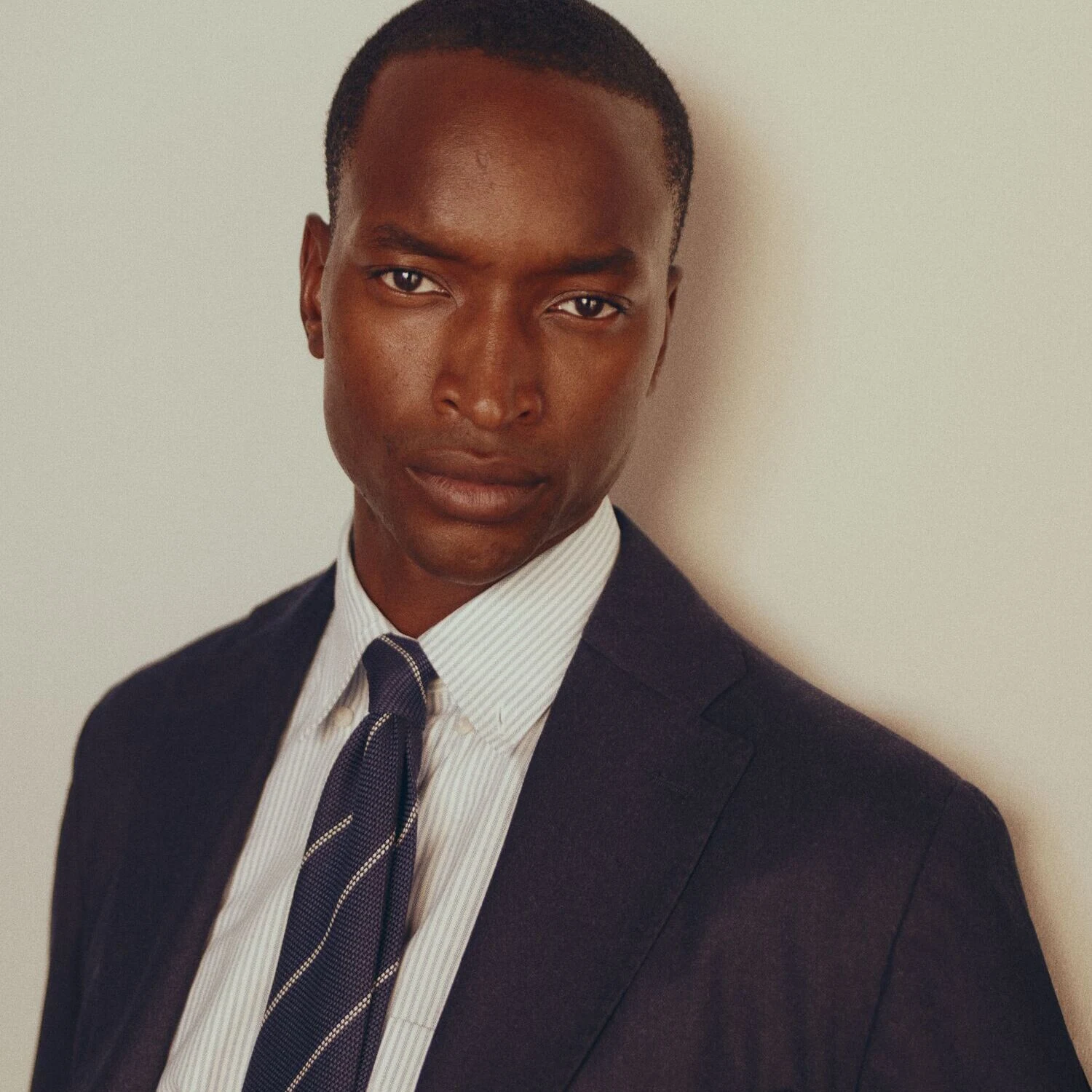 a man in an oxford shirt