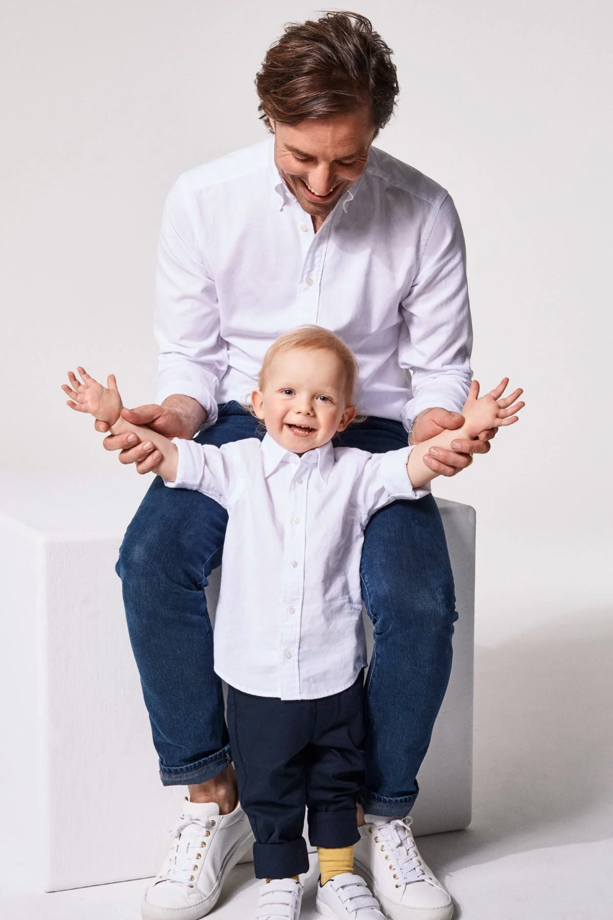 model with child wearing white shirts