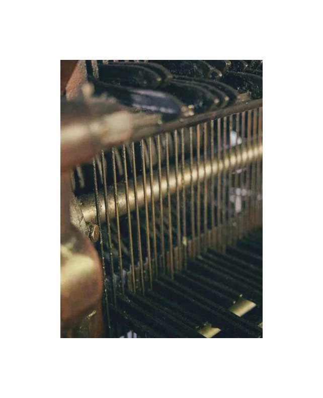 a close up of a weaving machine