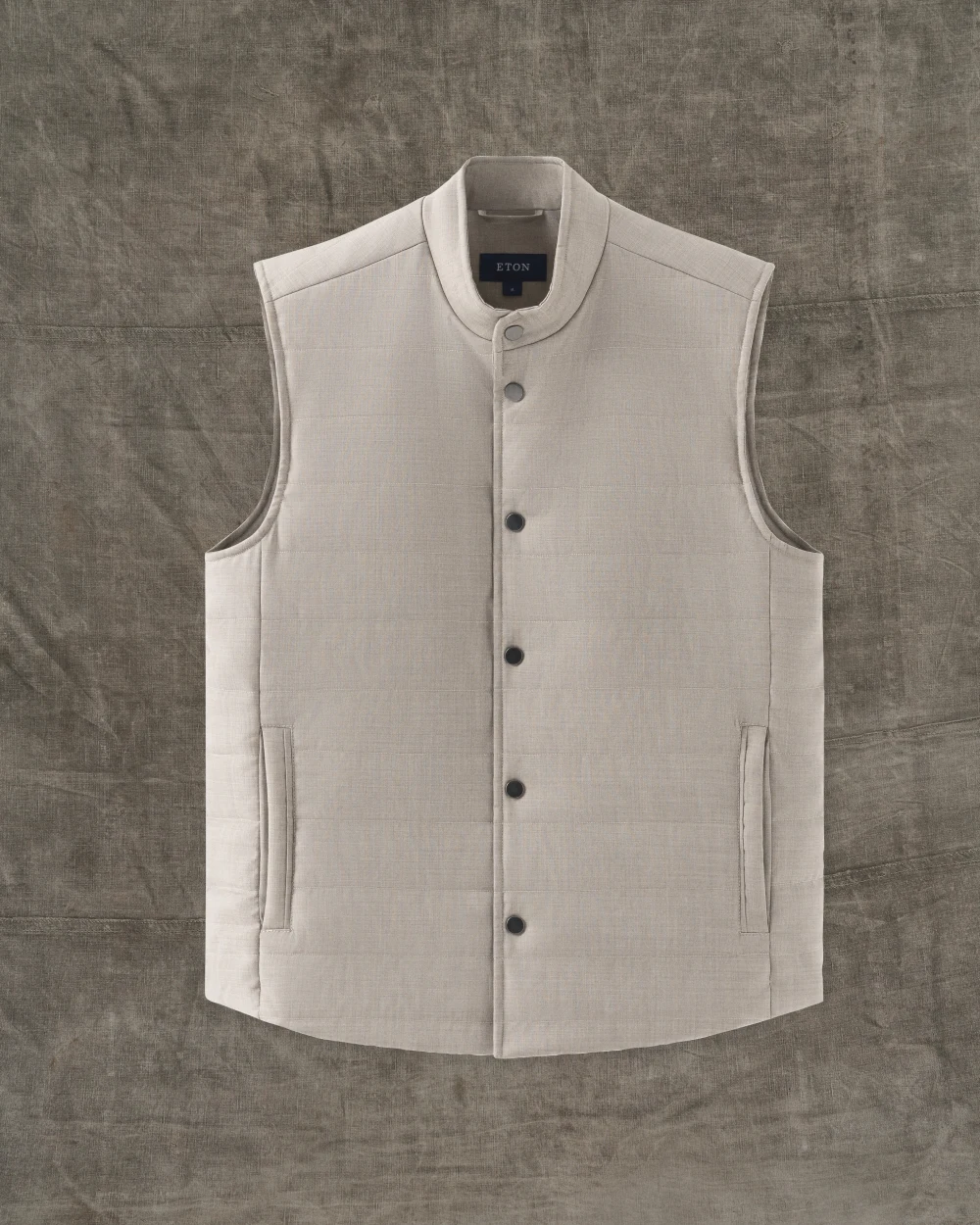 beige padded vest