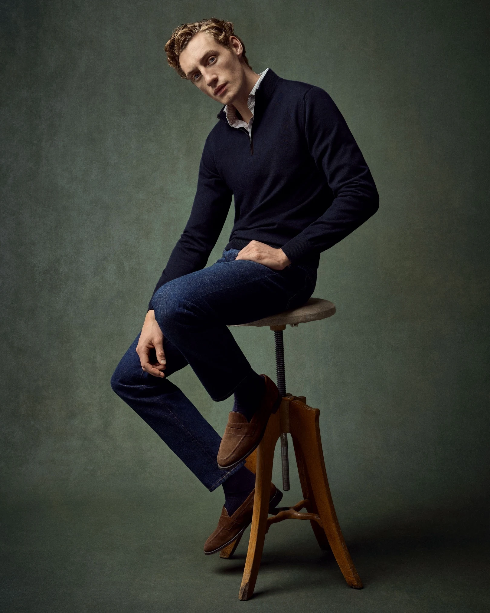 model in knit shirt and jeans