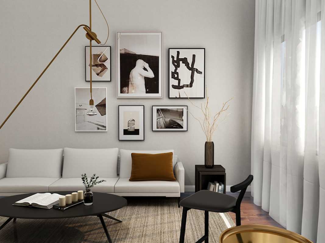Living-room-with-white-sofa-and-paintings