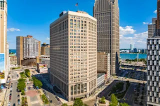 An exterior photograph of the First National Building in Downtown Detroit.