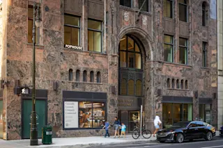 An exterior photograph of the ground level of The Stott.