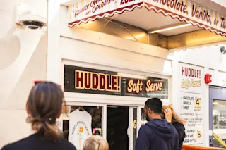 Exterior photo of Huddle Soft Serve at the back of Fourteen56 in downtown Detroit.