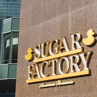Exterior signage of Sugar Factory at One Campus Martius. 